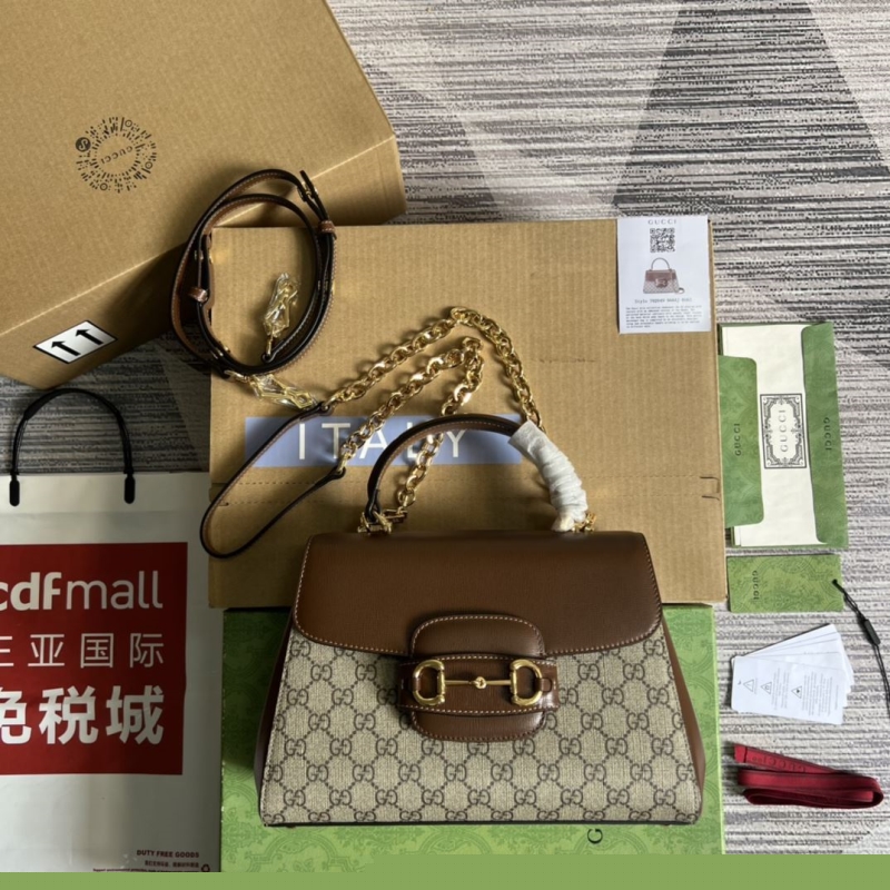 G*u*i top handle bags